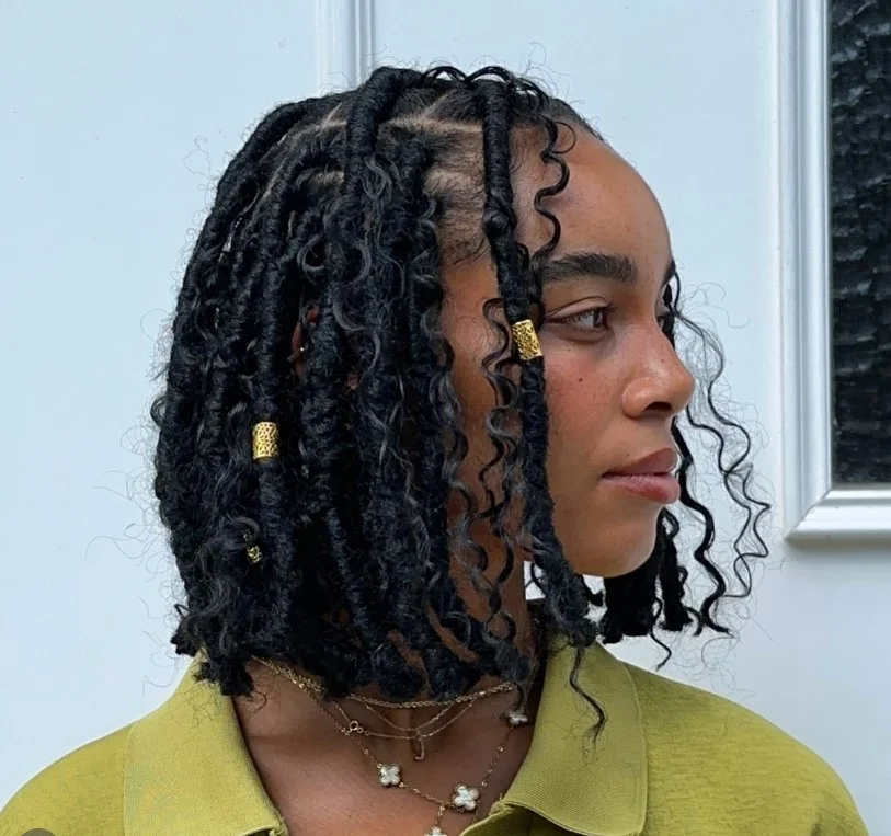 Bob crochet braids decorated with beads and accessories.