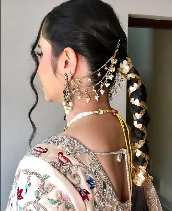 Bridesmaid braids hairstyles Braided Bun With Twists for polished and elegant prom or bridal updos