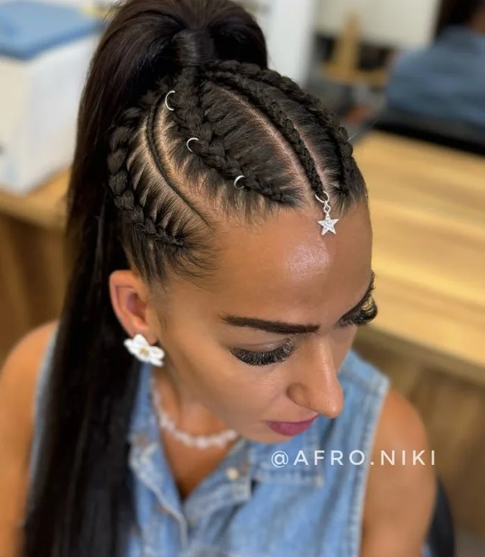 Bridal 4 cornrow braids hairstyle styled into elegant updo with pearl accessories