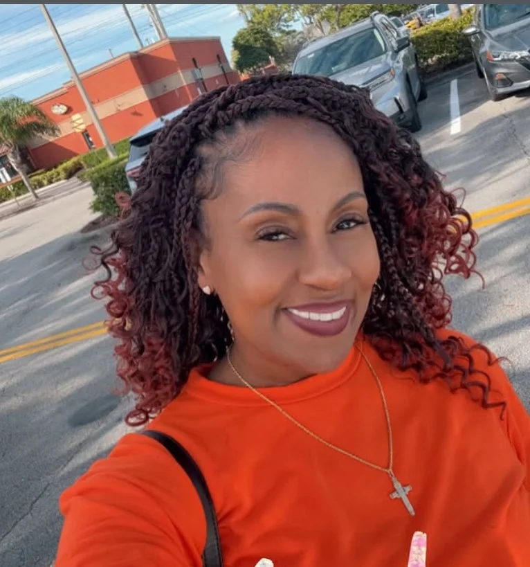 Burgundy crochet box braids hairstyle with rich, bold color.