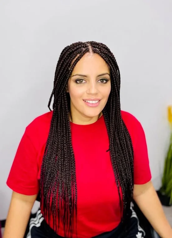 Cornrows with small box braids hairstyle showing intricate scalp braiding