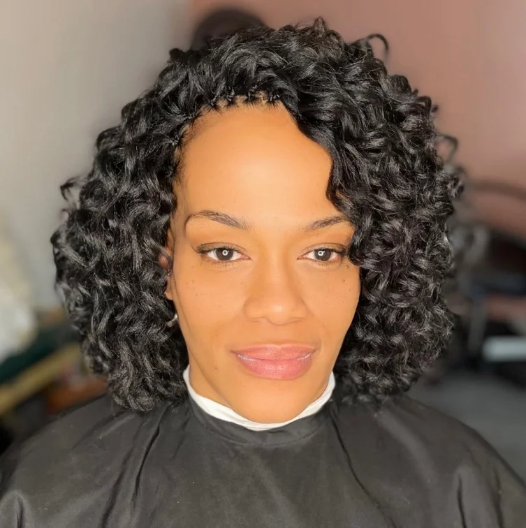 Short curly crochet braids styled into a chic bob for everyday protective wear