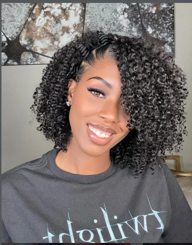 Curly bob short crochet braids hairstyle with soft textured curls framing the face.