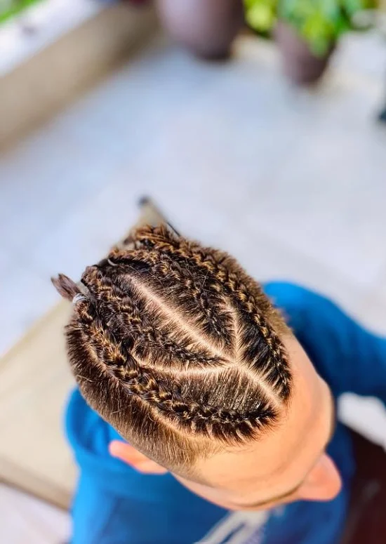 Artistic curved cornrows scalp braid design