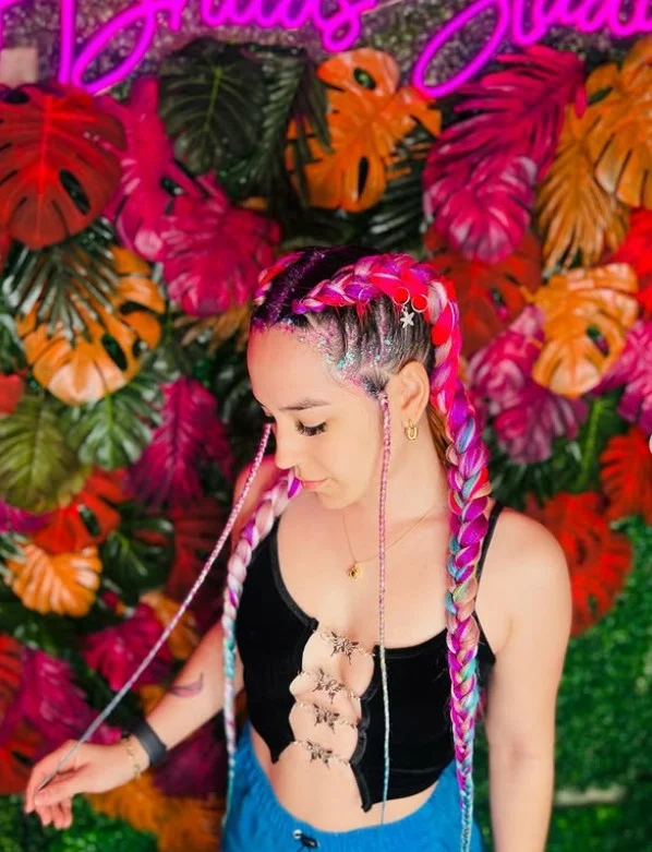 Festival-ready 2 cornrow braids hairstyles with hair cuffs and trendy braided accessories