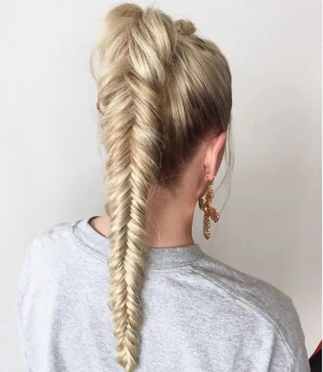 Bridesmaid braids hairstyles Fishtail Pony With Accessory for chic and modern prom or bridal styles