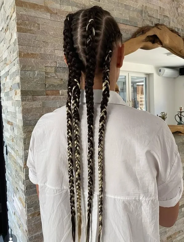 Protective 4 cornrow braids hairstyle designed for natural hair growth and length retention