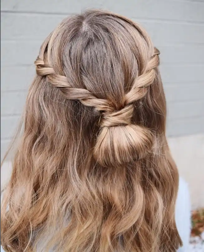 French Braid Half-Up prom hairstyle with soft flowing waves