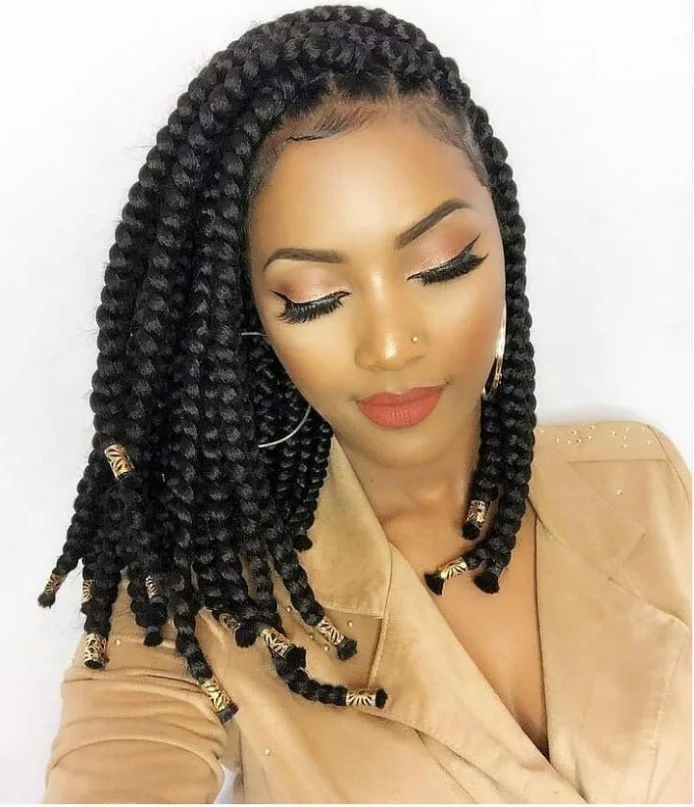 Jumbo crochet box braids hairstyle with thick and bold braid sections.
