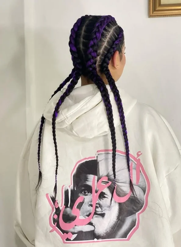 Jumbo 4 cornrow braids hairstyle with thick scalp braids and bold protective styling
