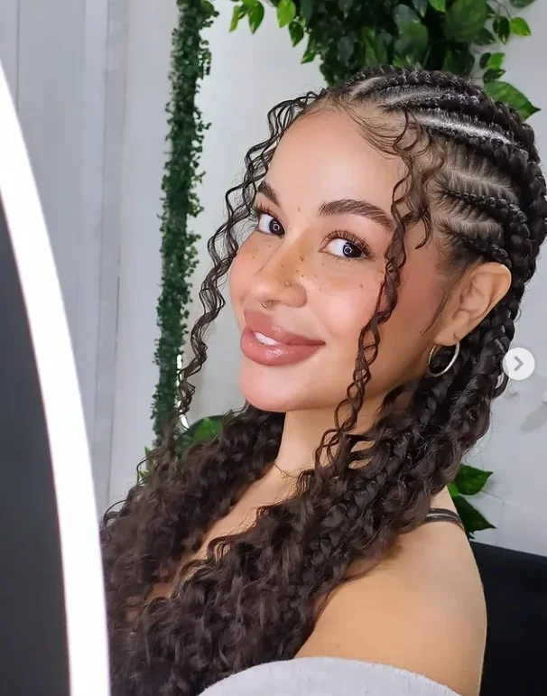 Jumbo Ghana braids cornrow hairstyle with thick, bold braids for statement-making protective style