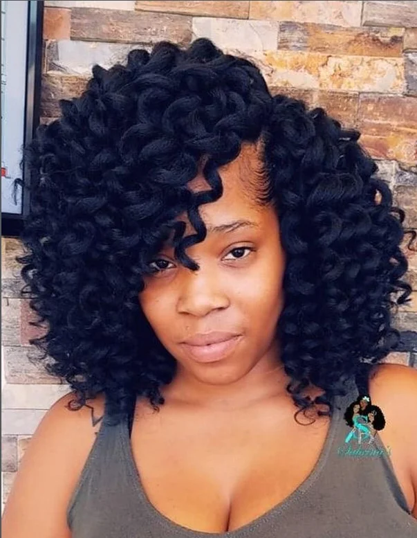 Layered curly crochet bob with soft layers for added volume and dimension.