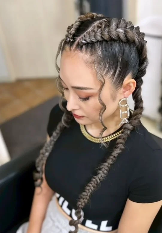 Short 2 cornrow braids hairstyles close to the scalp with neat parting and low-maintenance finish