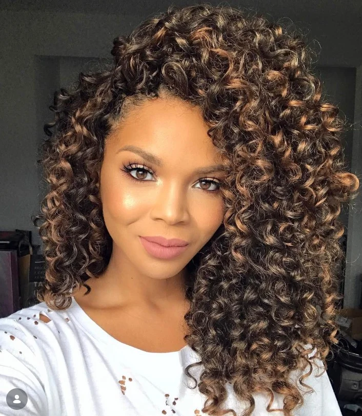 Short crochet braids with a deep side part for added volume and style.