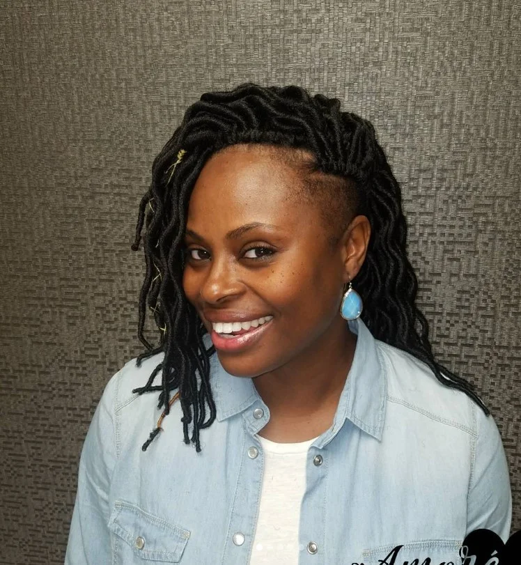 Tapered short crochet hairstyle with shorter sides and fuller top.