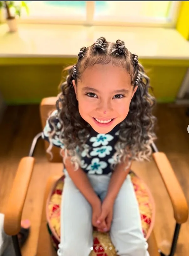 Trendy half cornrow braids hairstyle with loose hair