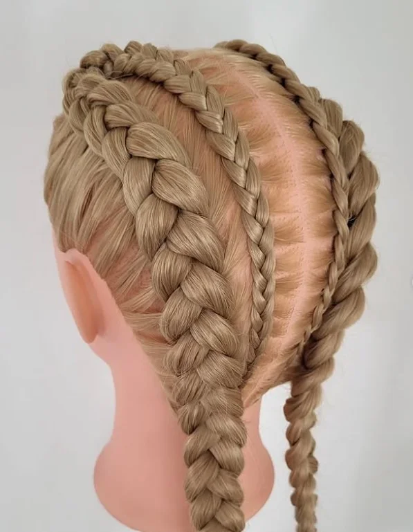 Edgy 4 cornrow braids hairstyle paired with undercut and clean scalp design