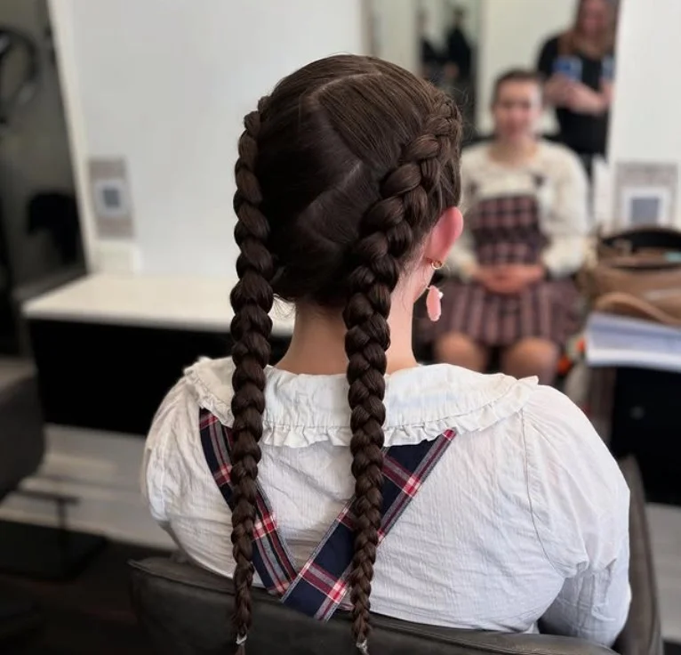 Creative 2 cornrow braids hairstyles with bold zig-zag scalp parting design