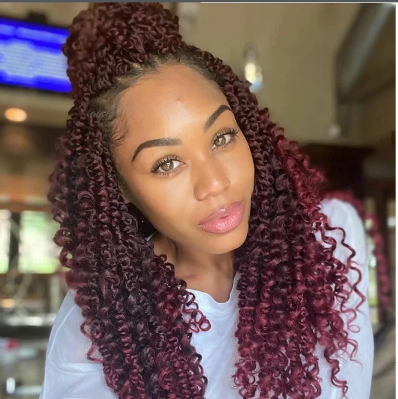 Bohemian crochet twist braids with loose curly ends.