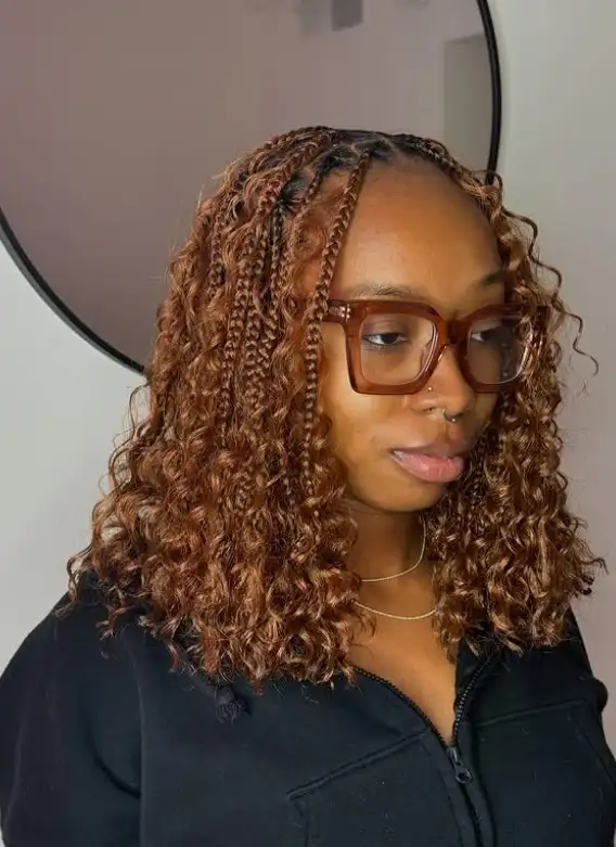 boho bob box braids hairstyles with loose curly strands mixed with neat braids for a relaxed bohemian braided bob look