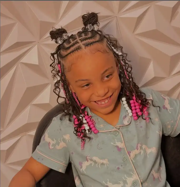 Half-up half-down braided hairstyle for child