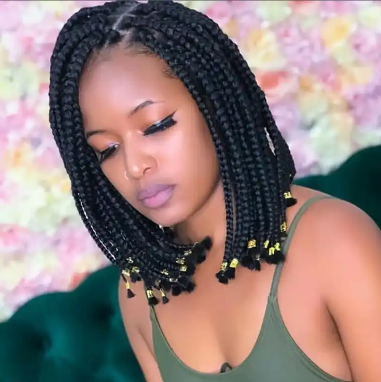 Timeless classic box bob braids hairstyle 2026 featuring medium box braids styled into a protective braided bob haircut.