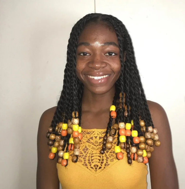 Crochet twist braids styled with decorative beads.