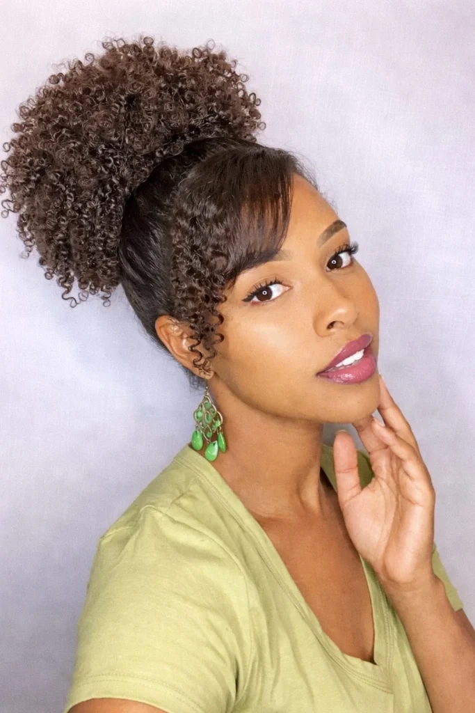 Black hairstyle high puff ponytail with side bangs voluminous natural style