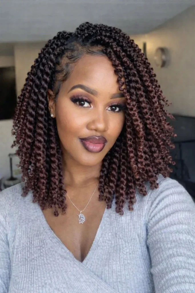 Layered crochet twist braids adding movement and shape.
