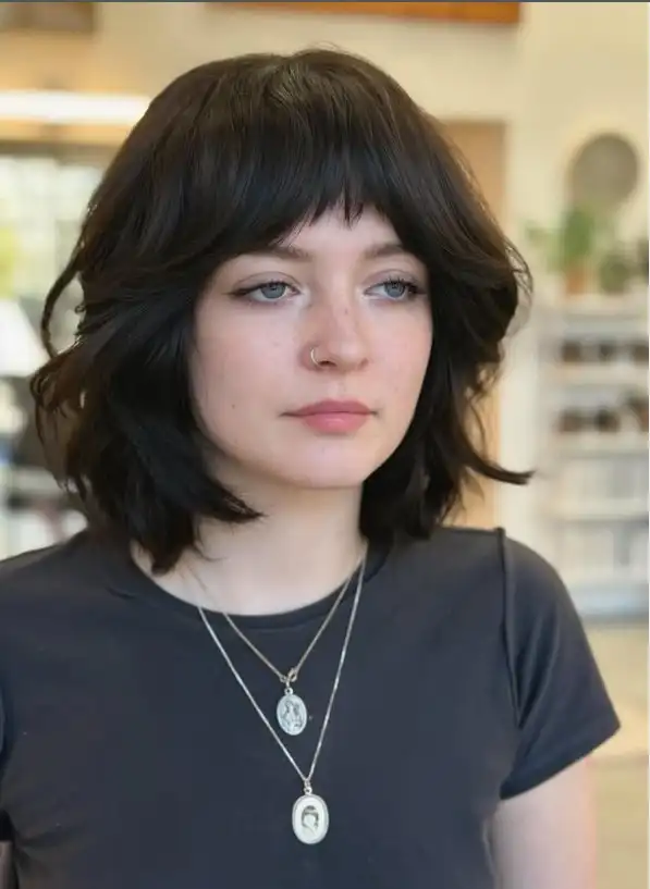 Layered messy shag with fine fringe