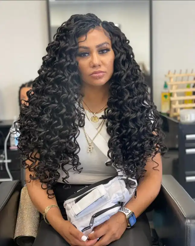 Long layered deep wave crochet braids hairstyle.