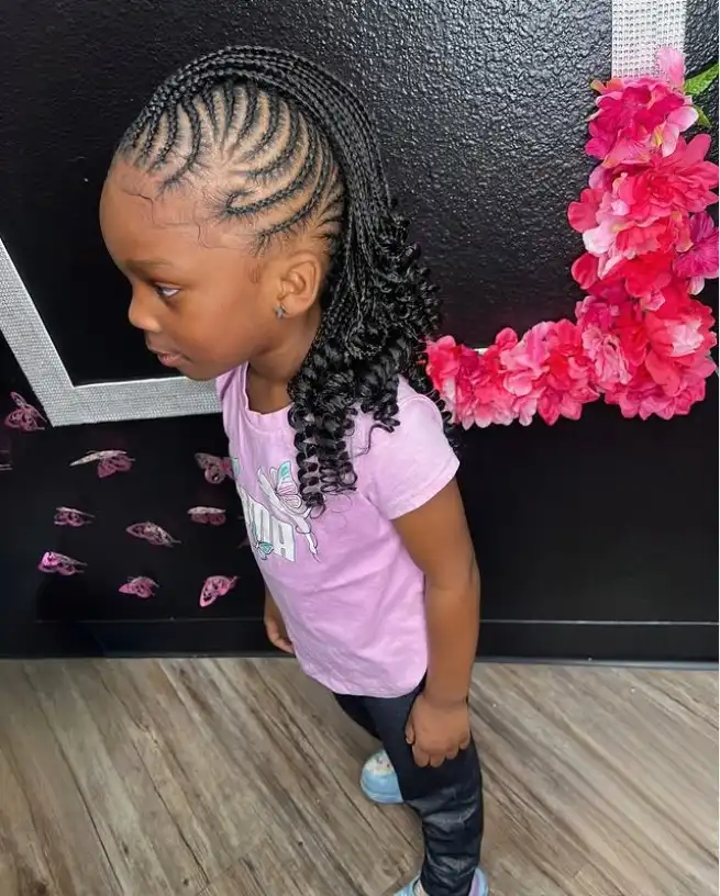 loose curl braided mohawk hairstyle for children