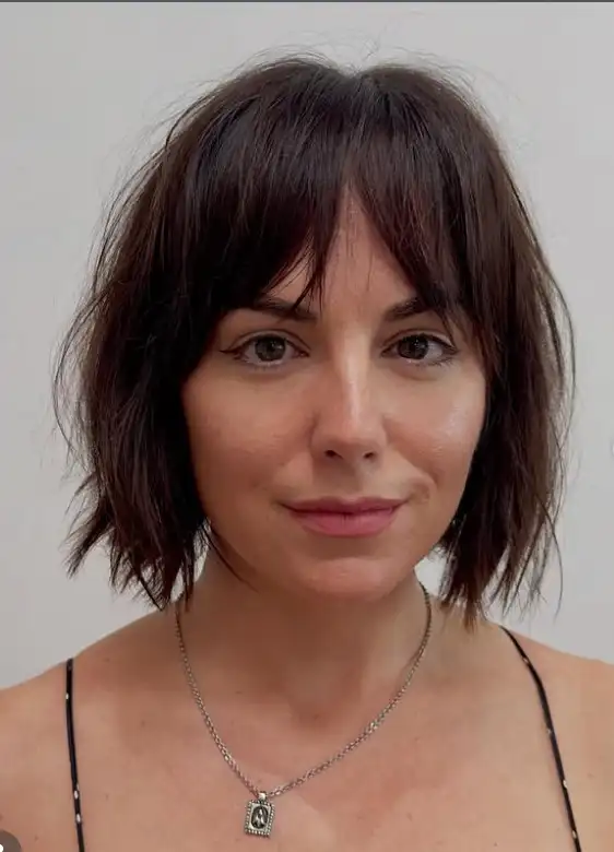 razor cut short hairstyles with fringe bangs textured haircut