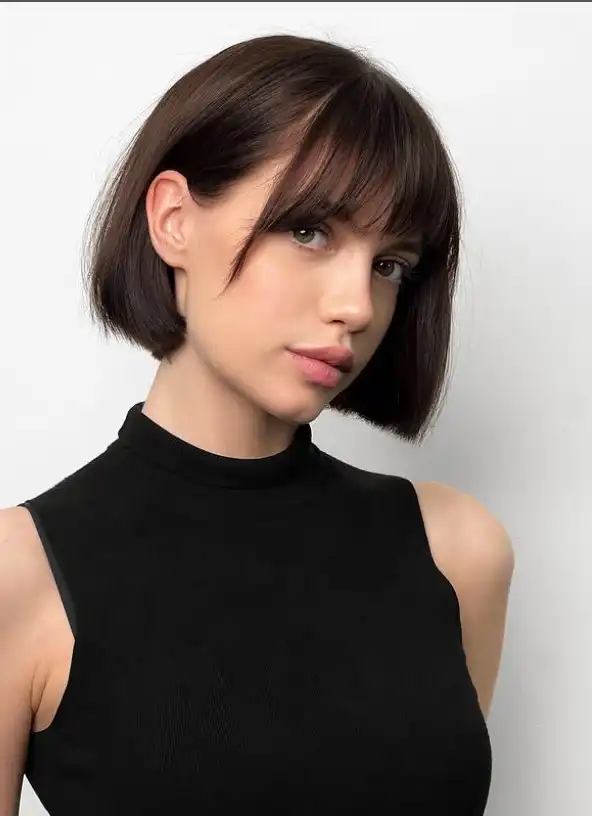Rounded short bob with full subtle fringe