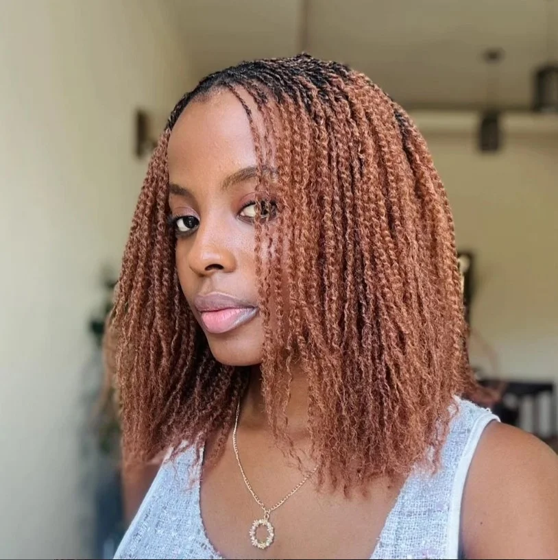 Short Marley crochet twist braids with natural kinky texture.