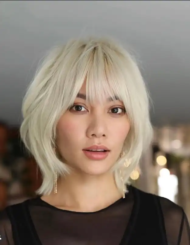 short shag haircut with fringe bangs trendy hairstyle