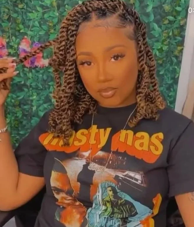 Shoulder-length Senegalese crochet twist braids with smooth finish.