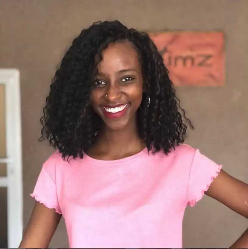 Shoulder-length wavy crochet braids with natural volume.