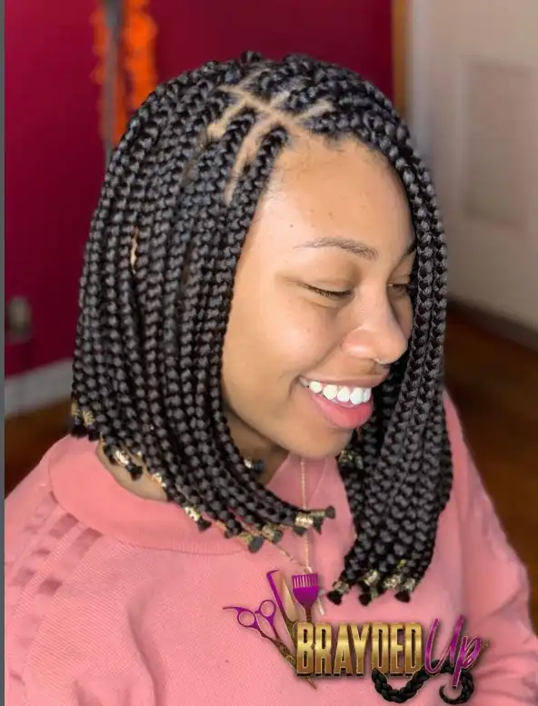 Elegant side parted bob braids hairstyle 2026 with deep side part creating volume and a modern braided bob appearance.