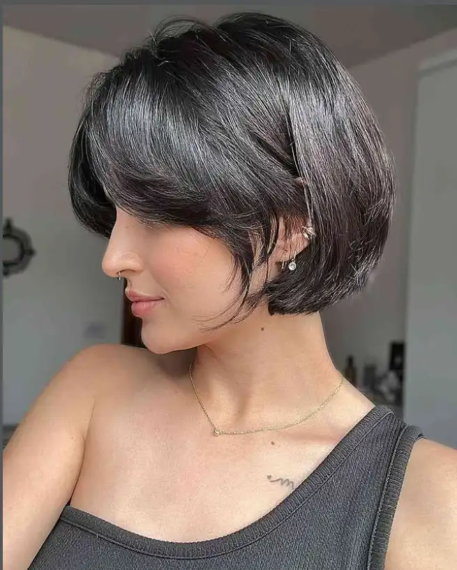 sleek short hairstyles with long bangs smooth haircut