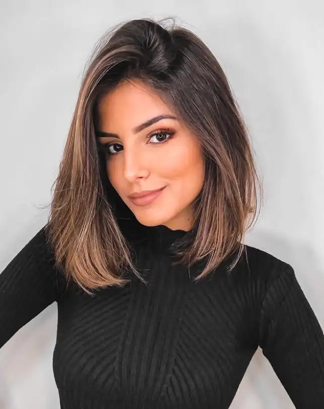 Soft layered lob hairstyle with side bangs natural volume