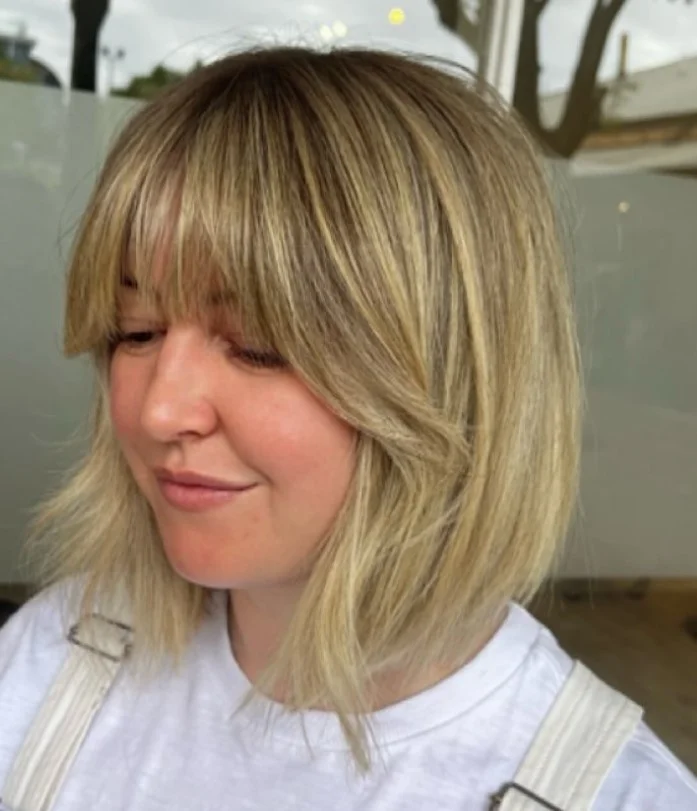 textured bob short hairstyles with fringe bangs modern women haircut