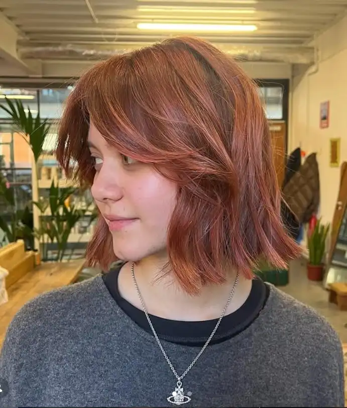 tousled bob short hairstyles with long bangs trendy haircut