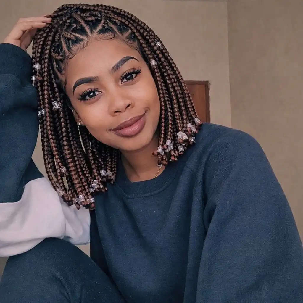 triangle part bob box braids hairstyles with geometric braid sections creating a unique patterned braided bob