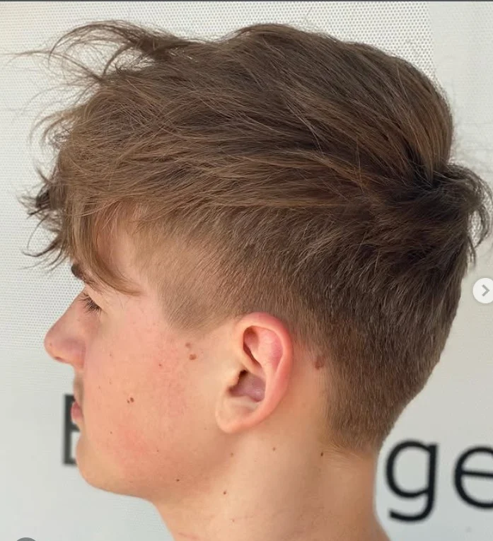 Undercut hairstyle with long bangs for modern men