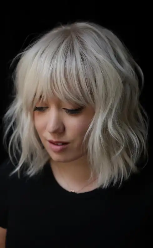 wavy bob short hairstyles with long bangs soft hairstyle