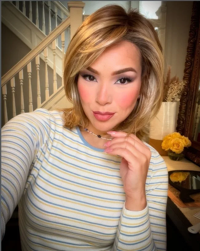 Feathered layered bob hairstyle with side bangs soft layered texture