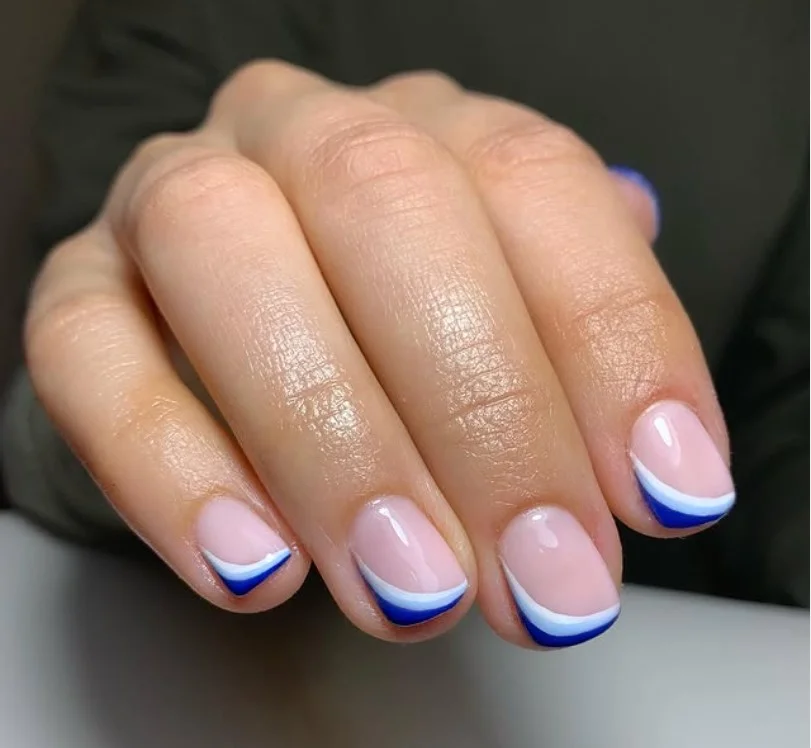 blue French tip nails with white lines, square nails