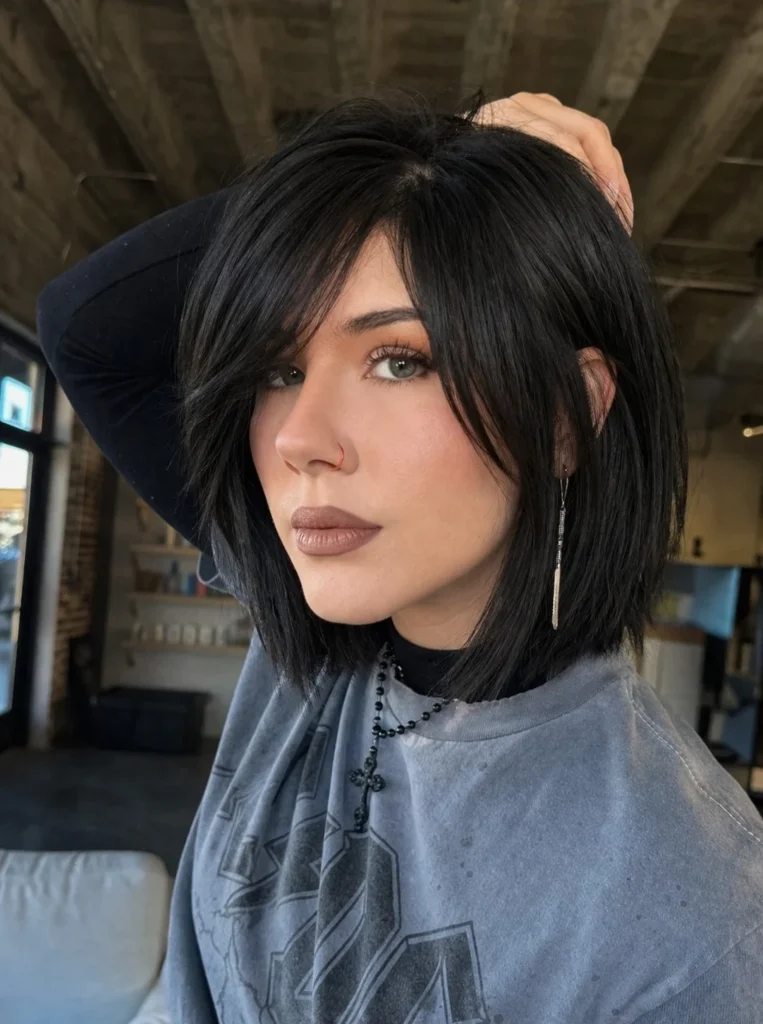 Blunt layered bob hairstyle with side fringe modern sharp look
