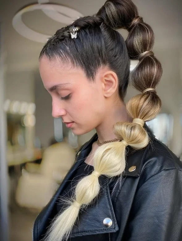 bubble ponytail trendy beach hairstyle for long hair
